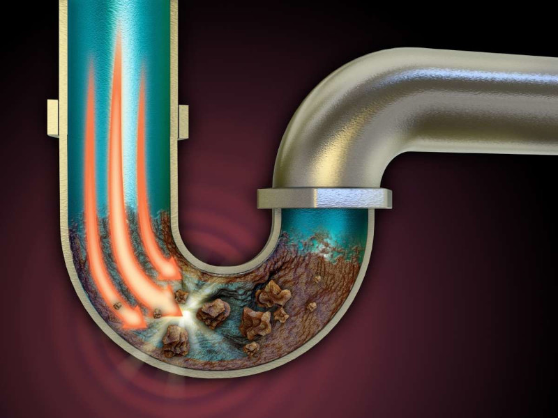 High-pressure water jetting used to clear drain buildup